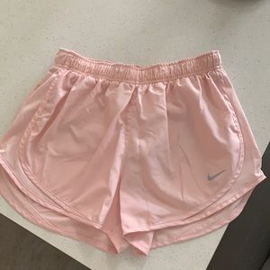 Pink Nike running shorts